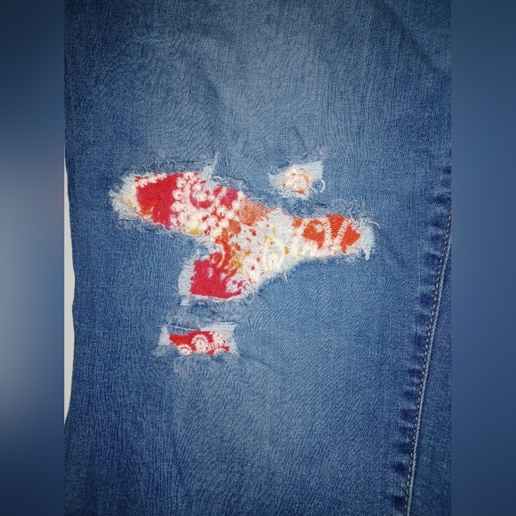 A Torrid Feel The Fit Midfit Super Skinny Jeans - Picture 5 of 9